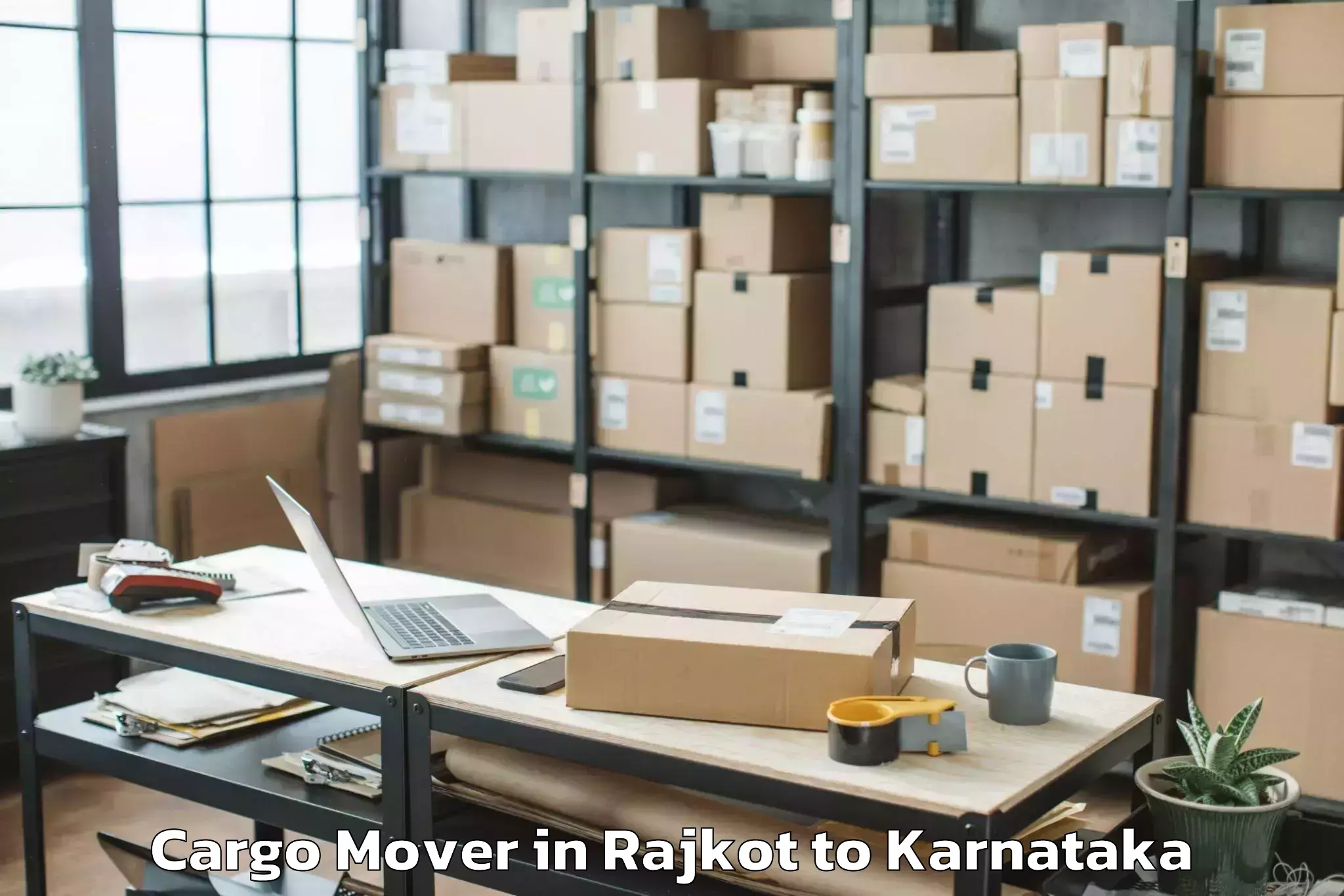 Trusted Rajkot to Karnataka State Rural Developm Cargo Mover